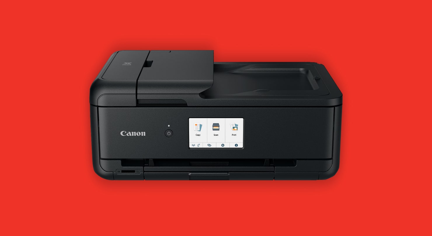 Image of Canon PIXMA TS9520 on a red background.