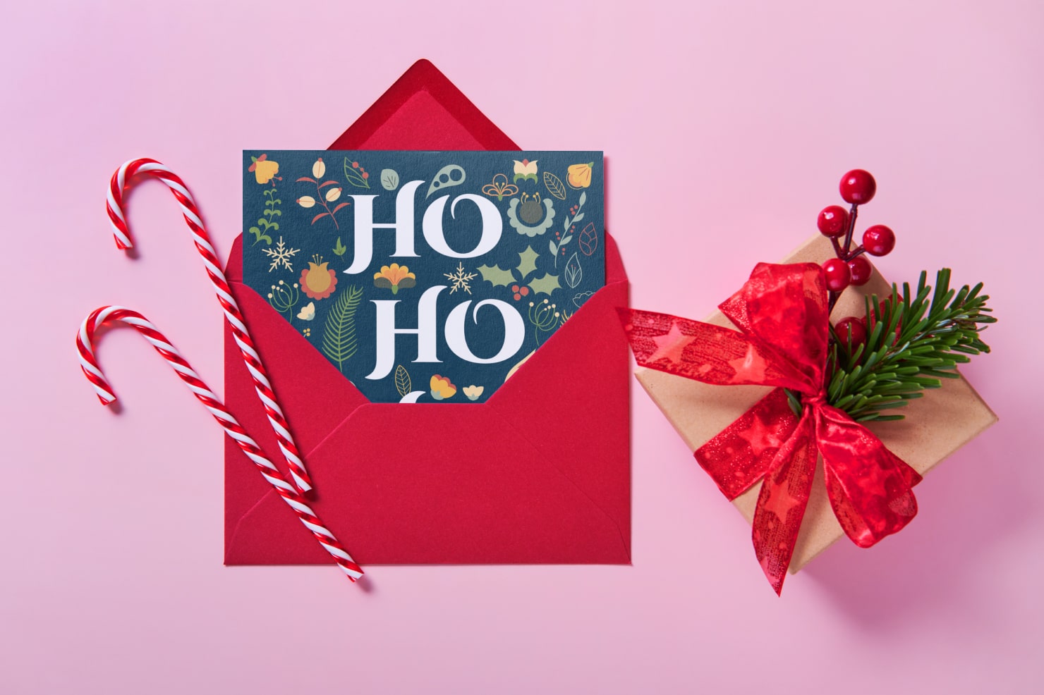 Pinkish-red envelope with printed Christmas party invitation.