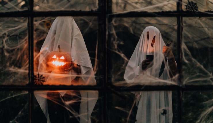 Spooky, scary ghosts with Jack-o'-lantern.