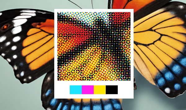 Image for the CMYK in Printing, How it Works and Why it’s Used article with CMYK dots.