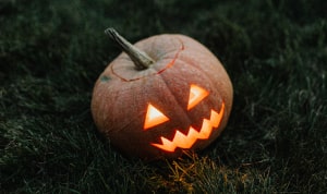 Amazing Halloween Party Ideas article preview with a spooky pumpkin Jack-o'-lantern.